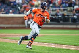 Astros baseball player running bases